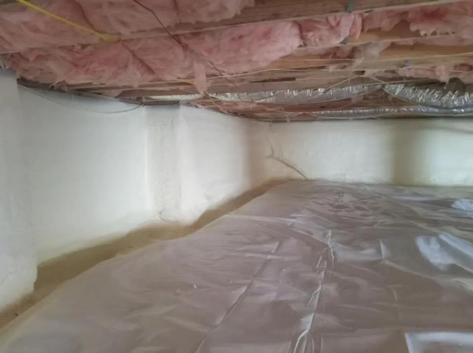 Crawl space encapsulation with closed-cell spray foam for Commercial Roof Restoration in White Lake